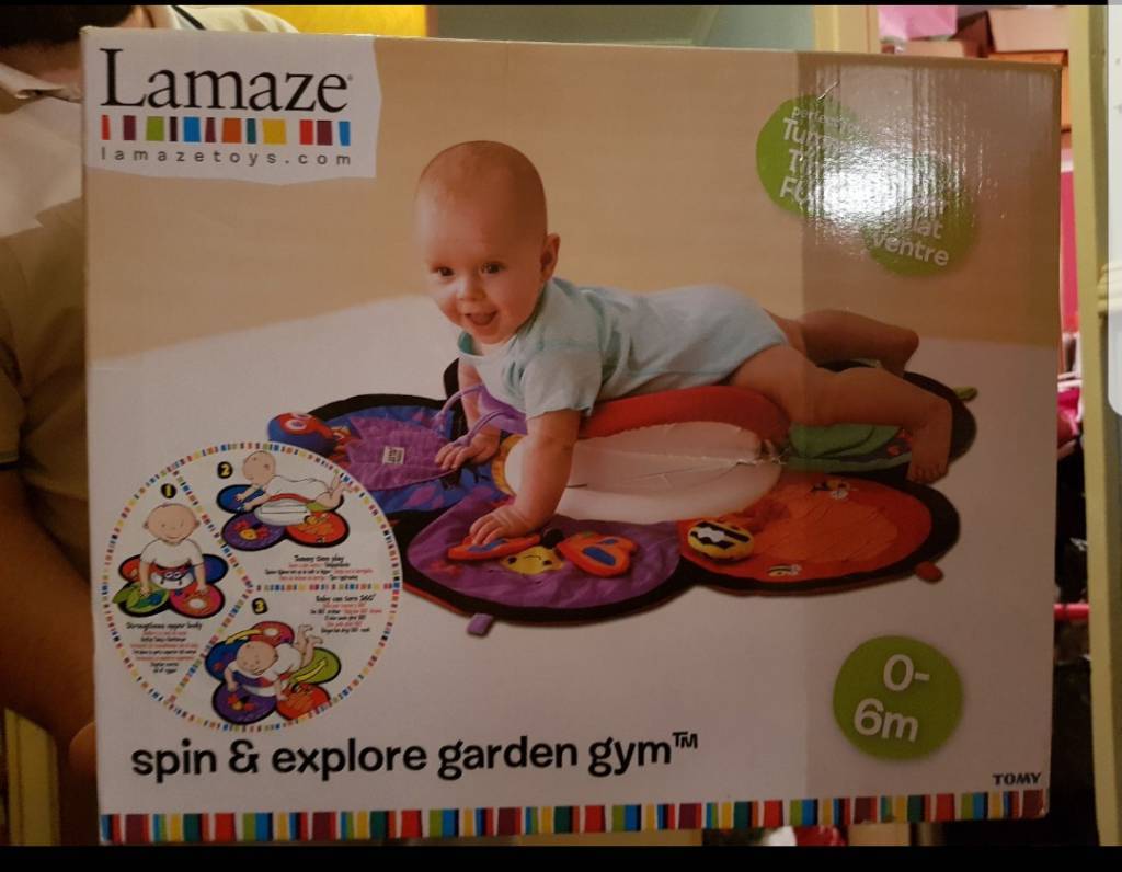 tomy lamaze spin and explore garden gym